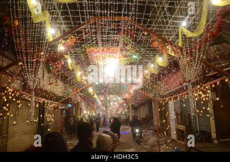 Lahore, Pakistan. 11th Dec, 2016. Pakistani devotee people decorating a market with colorful stuff on the celebration of Eid Milad-un-Nabi, the birthday of the Prophet Muhammad. The birth of the Prophet Mohammed is celebrated on on 12 Rabil ul Awal in the Muslim calendar. The birth of the Prophet Mohammed is celebrated on 12 Rabil ul Awal in the Muslim calendar Credit:  Rana Sajid Hussain/Pacific Press/Alamy Live News Stock Photo