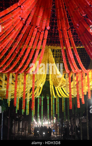 Lahore, Pakistan. 11th Dec, 2016. Pakistani devotee people decorating a market with colorful stuff on the celebration of Eid Milad-un-Nabi, the birthday of the Prophet Muhammad. The birth of the Prophet Mohammed is celebrated on on 12 Rabil ul Awal in the Muslim calendar. The birth of the Prophet Mohammed is celebrated on 12 Rabil ul Awal in the Muslim calendar Credit:  Rana Sajid Hussain/Pacific Press/Alamy Live News Stock Photo