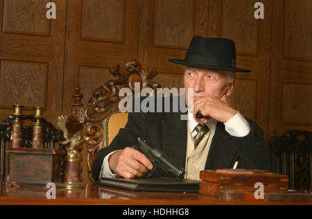 Mature male mafia boss Stock Photo