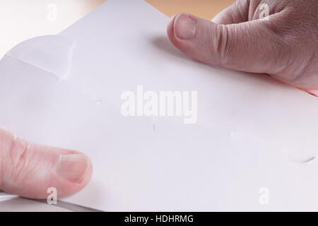 hands opening letter Stock Photo