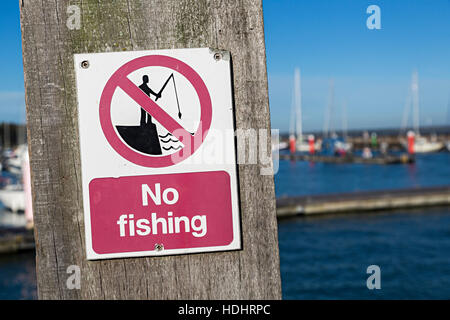 No fishing sign in harbour, Yarmouth, Isle of Wight, UK Stock Photo