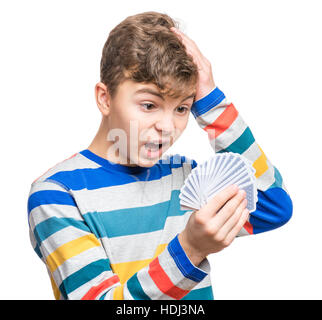Teen boy with gamble cards