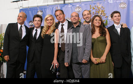 The cast from the Emmy winning television series 'Arrested Development' at the 56th Annual Emmy Awards  in Los Angeles, California on Sunday 19 September, 2004.  From left to right, Jeffrey Tambor, Jason Bateman, Portia de Rossi, Will Arnett, David Cross, Tony Hale, Alia Shawkat, and Michael Cera. Photo credit: Francis Specker Stock Photo