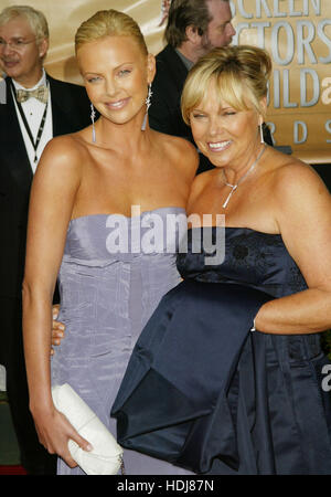 Charlize Theron and mother, Gerda, arrives at the Screen Actors Guild Awards in Los Angeles, California on  February 22, 2004.  Photo credit: Francis Specker Stock Photo