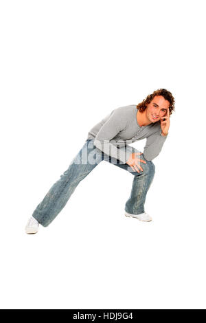 portrait of young man with curly hair and nice smile isolated on a white background Stock Photo
