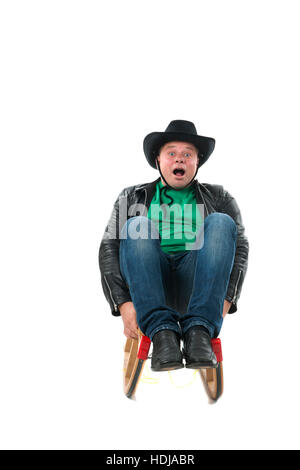 Funny guy on a sleigh isolated on a white background Stock Photo