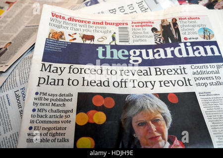 May forced to reveal Brexit plan to head off Tory revolt' Guardian newspaper headlines front page article 2016 London England UK Stock Photo