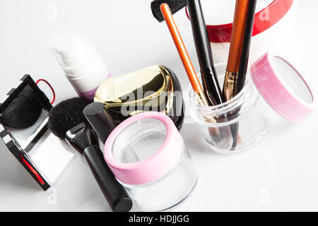 Professional makeup brushes and tools, make-up products set on isolated white Stock Photo