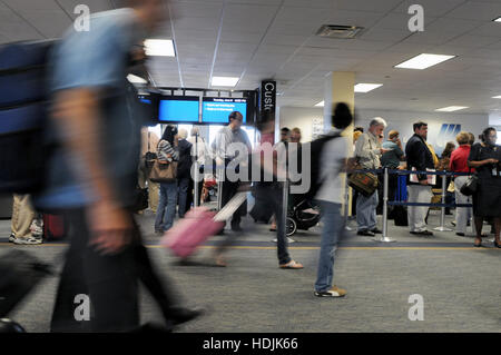Passengers at departure gate at Washington Dulles International Airport in Virginia, USA. Stock Photo