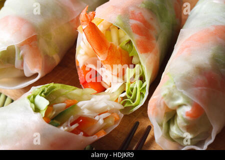 sliced the spring rolls with shrimp vegetables macro on the table. horizontal Stock Photo