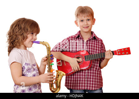 little girl and boy play music Stock Photo