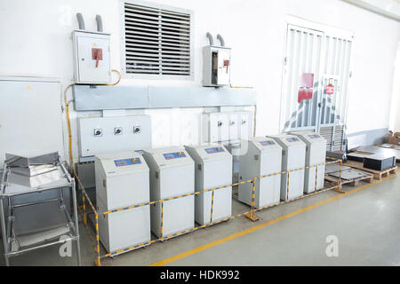 operating console of the modern powerful metal cutting laser mashine at factory. Stock Photo