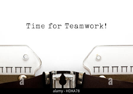 Time For Teamwork typed on retro typewriter. Stock Photo