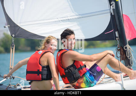 Couple on sailing vessel Stock Photo