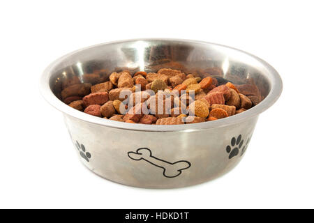 Silver bowl filled with dogfood isolated over white Stock Photo