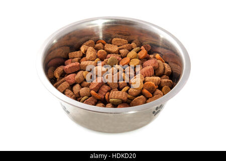 Dog food in silver bowl isolated over white Stock Photo