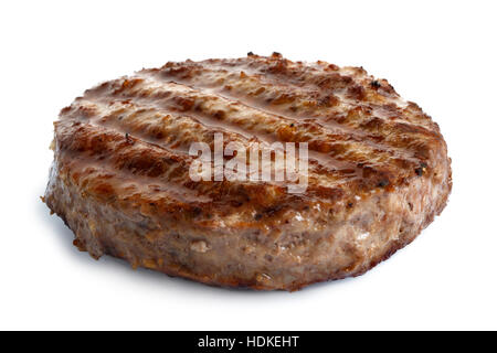 Single grilled hamburger patty isolated on white. Stock Photo