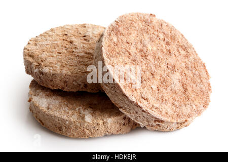 Three frozen hamburger patties isolated on white. Stock Photo