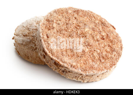 Two frozen hamburger patties isolated on white. Stock Photo