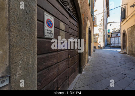 No parking sign on a double gate. Lucca. Lucca city, Tuscany, Italy Stock Photo