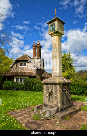 Ornate sundial in the centre of the village green at Blaise hamlet designed by John Nash for the Blaise Castle estate in Bristol UK Stock Photo