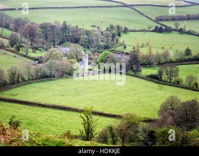 Looking down on the village and church tower of The Blessed Virgin Mary at Oare on Exmoor Devon associated with R D Blackmore's Lorna Doone Stock Photo