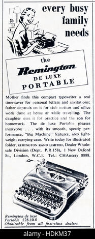 A 1950s magazine advertisement advertising the Remington De Luxe portable typewriter. Stock Photo