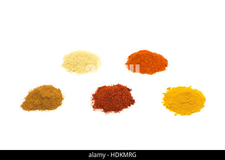 Heaps of five seasoning spices isolated on white background Stock Photo