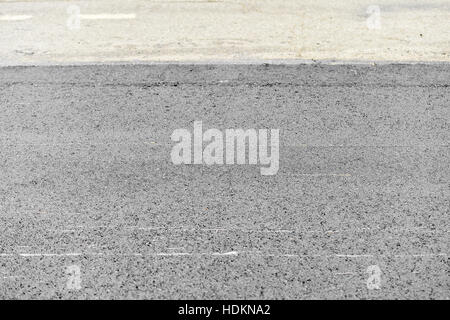 Asphalt paving with a steel wheel roller Stock Photo