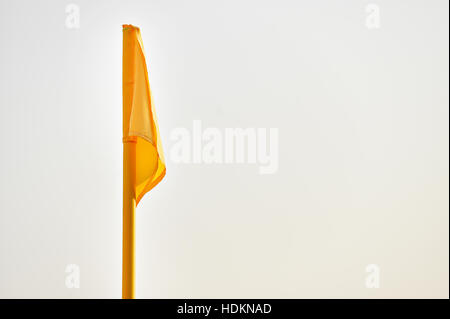 Detail shot with yellow corner flag on a soccer field Stock Photo