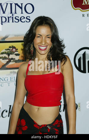 Actress Delilah Cotto poses for photographers at the post Latin Grammys