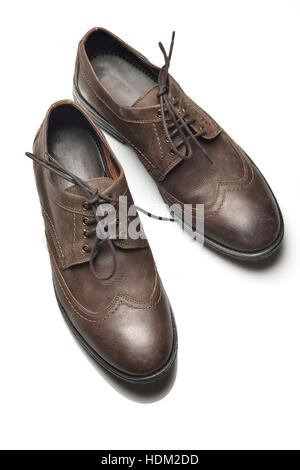 Top View of Dark Brown Leather Shoes on White Background Stock Photo