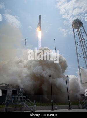 The Orbital Sciences Corporation Antares rocket with Cygnus spacecraft onboard launches from Launch Pad-0A at the NASA Wallops Flight Facility to begin its Orbital-2 cargo delivery flight mission to the International Space Station July 13, 2014 in Chicoteague Island, Virginia.