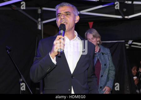 Mayor of London Sadiq Khan as Eddy Grant turns on a new Electric Avenue illuminated sign to mark the completion of £1m refurbishment works along the market street in Brixton, London.  Featuring: Sadiq Khan Where: London, United Kingdom When: 17 Oct 2016 Stock Photo