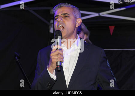 Mayor of London Sadiq Khan as Eddy Grant turns on a new Electric Avenue illuminated sign to mark the completion of £1m refurbishment works along the market street in Brixton, London.  Featuring: Sadiq Khan Where: London, United Kingdom When: 17 Oct 2016 Stock Photo