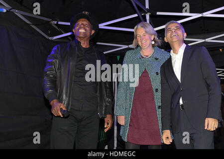 Lib Peck, Leader of Leader of Lambeth Council, and Mayor of London Sadiq Khan as Eddy Grant turns on a new Electric Avenue illuminated sign to mark the completion of £1m refurbishment works along the market street in Brixton, London.  Featuring: Eddy Gran Stock Photo