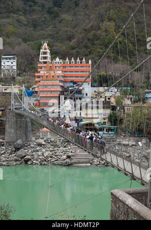 Laxman Jhula bridge over Ganges river in Rishikesh, Uttarakhand, India Stock Photo