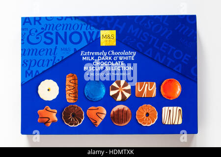 box of M&S Extremely Chocolatey milk dark & white chocolate biscuit selection isolated on white background Stock Photo