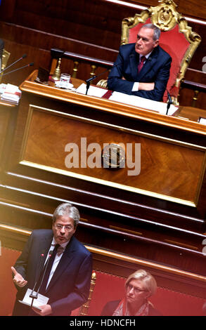 Rome, Italy. 14th Dec, 2016. Italian Prime Minister Paolo Gentiloni (L, bottom) gives a speech ahead of a confidence vote at the upper house in Rome, capital of Italy, on Dec. 14, 2016. The new cabinet of Italian Prime Minister Paolo Gentiloni won the second of two confidence votes on Wednesday, paving the way for formally taking over the power. © Jin Yu/Xinhua/Alamy Live News Stock Photo