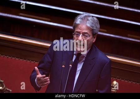 Rome, Italy. 14th Dec, 2016. Italian Prime Minister Paolo Gentiloni gives a speech ahead of a confidence vote at the upper house in Rome, capital of Italy, on Dec. 14, 2016. The new cabinet of Italian Prime Minister Paolo Gentiloni won the second of two confidence votes on Wednesday, paving the way for formally taking over the power. © Jin Yu/Xinhua/Alamy Live News Stock Photo