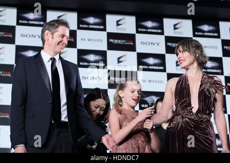 Director Paul W.S. Anderson(R) and his daughter Ever Anderson attend the  world premiere for the film Resident Evil: The Final Chapter in Tokyo,  Japan on December 13, 2016. Photo by Keizo Mori/UPI