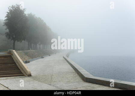 misty morning in Pskov , embankment and the river, foggy morning Stock Photo