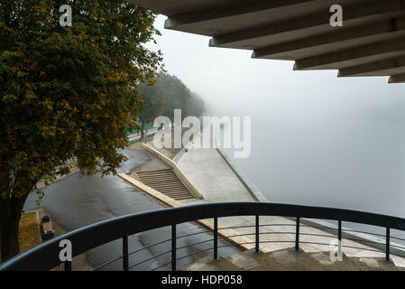 misty morning in Pskov , the river and the bridge, shrouded in fog Stock Photo
