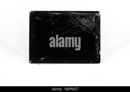 A harshly broken tablet after a fall Stock Photo