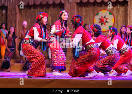 Nyishi Tribal Girls from Assam India performing Geyumja dance. Tribal Festival in Ajmer, Rajasthan, India Stock Photo