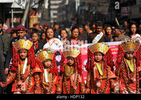 Kathmandu, Nepal. 13th Dec, 2016. Newari kids from Newar comunity impersonate as Goddess 'Kumari' during the celebration of Yomari Punhi and 13th National Jyapu Diwas, the Newari society organised a rally across the Basantapur Durbar Square, Kathmandu, Nepal on Tuesday, December 13, 2016. The rally reflected several culture and tradition of Newar society. Jatras and festivals are part of life for Newar community. Credit:  Narayan Maharjan/Pacific Press/Alamy Live News Stock Photo