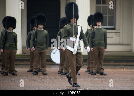 London, UK. 13th Dec, 2016. Footguards march at Wellington Barracks playground. The Foot Guards Battalions on public duties in London are located in barracks conveniently close to Buckingham Palace for them to be able to reach the Palace very quickly in an emergency. Credit:  Alberto Pezzali/Pacific Press/Alamy Live News Stock Photo