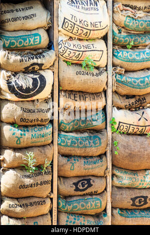 Stacked coffee sacks used a in the Skip Garden, a community resource providing a green oasis in the middle of the King’s Cross development, London, UK Stock Photo