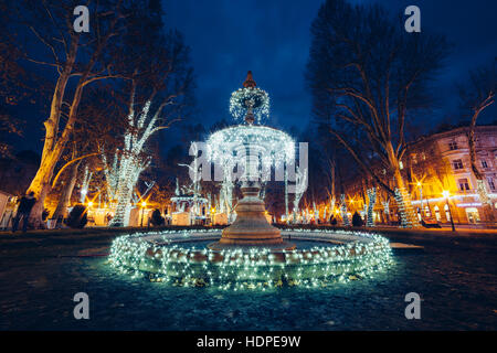 Illuminated fountain on Zrinjevac (Zagreb, Croatia), Christmas market (Advent) Stock Photo