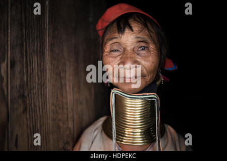 Portrait of a Kayan woman wearing the traditional brass neck rings, Loikaw, Myanmar. Stock Photo